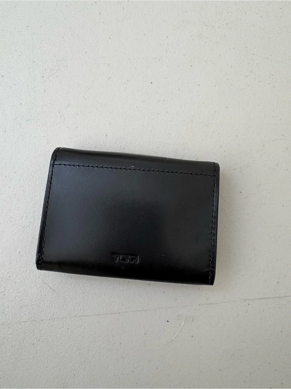 Tumi genuine leather